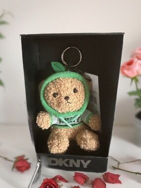 DKNY Brown Teddy Bear Bag Charm Or Key Chain with Green Hood and Leaf Accent